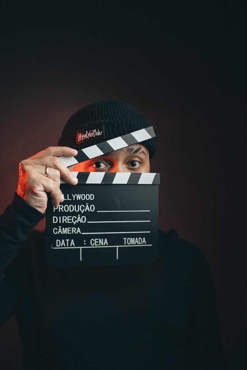 portrait of man with clapperboard