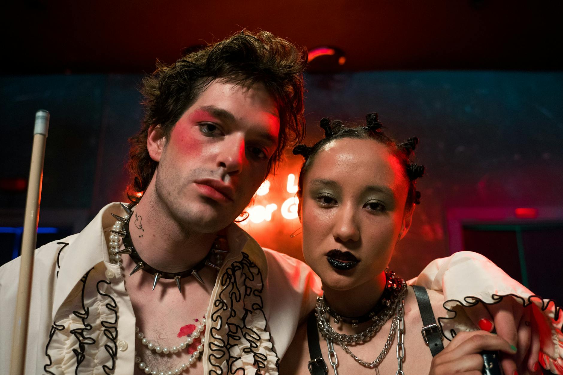 punk couple looking at camera